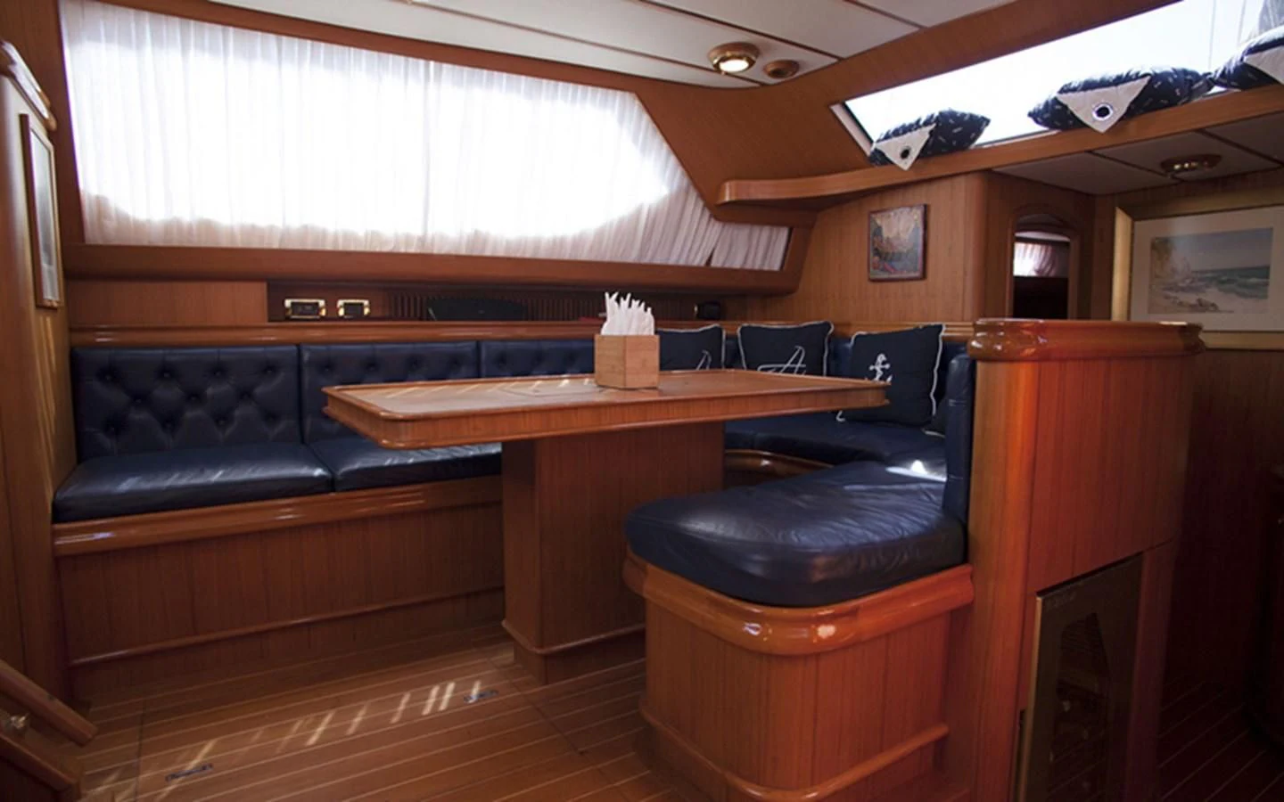 a room with a couch and a table aboard ARCADIA 3 Yacht for Sale