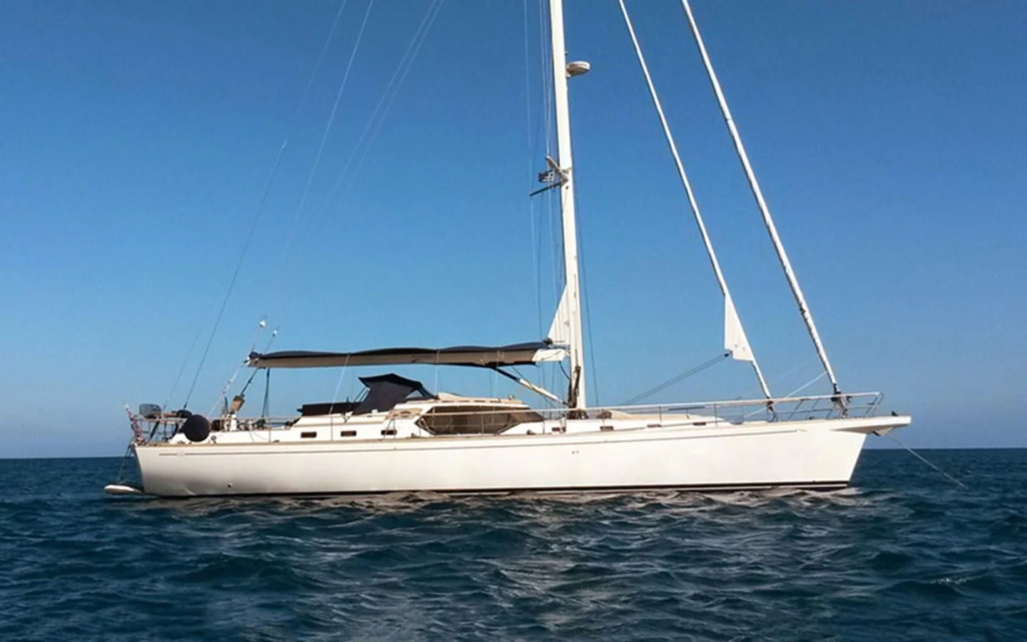 a white boat in the water aboard ARCADIA 3 Yacht for Sale