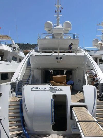 a large white boat with a large white ship on it aboard LADY MM Yacht for Sale