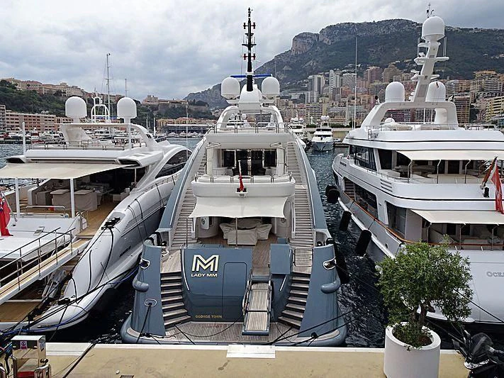a boat docked at a pier aboard LADY MM Yacht for Sale
