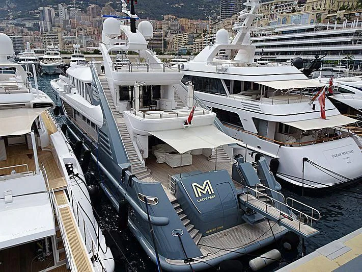 a group of boats are parked in a harbor aboard LADY MM Yacht for Sale