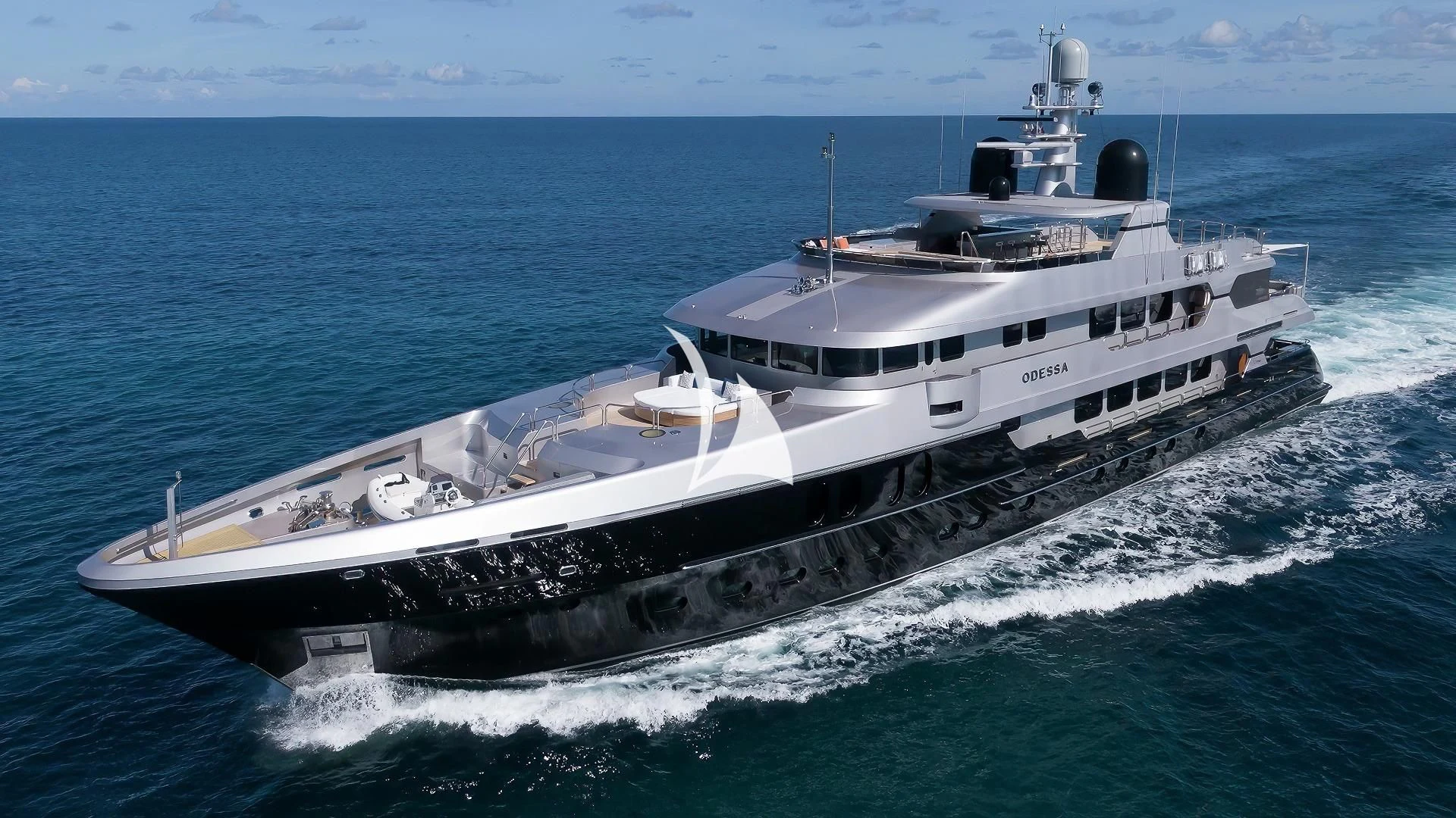 a large ship in the water aboard ODESSA Yacht for Sale