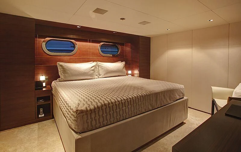 a bed in a room aboard ODESSA Yacht for Sale