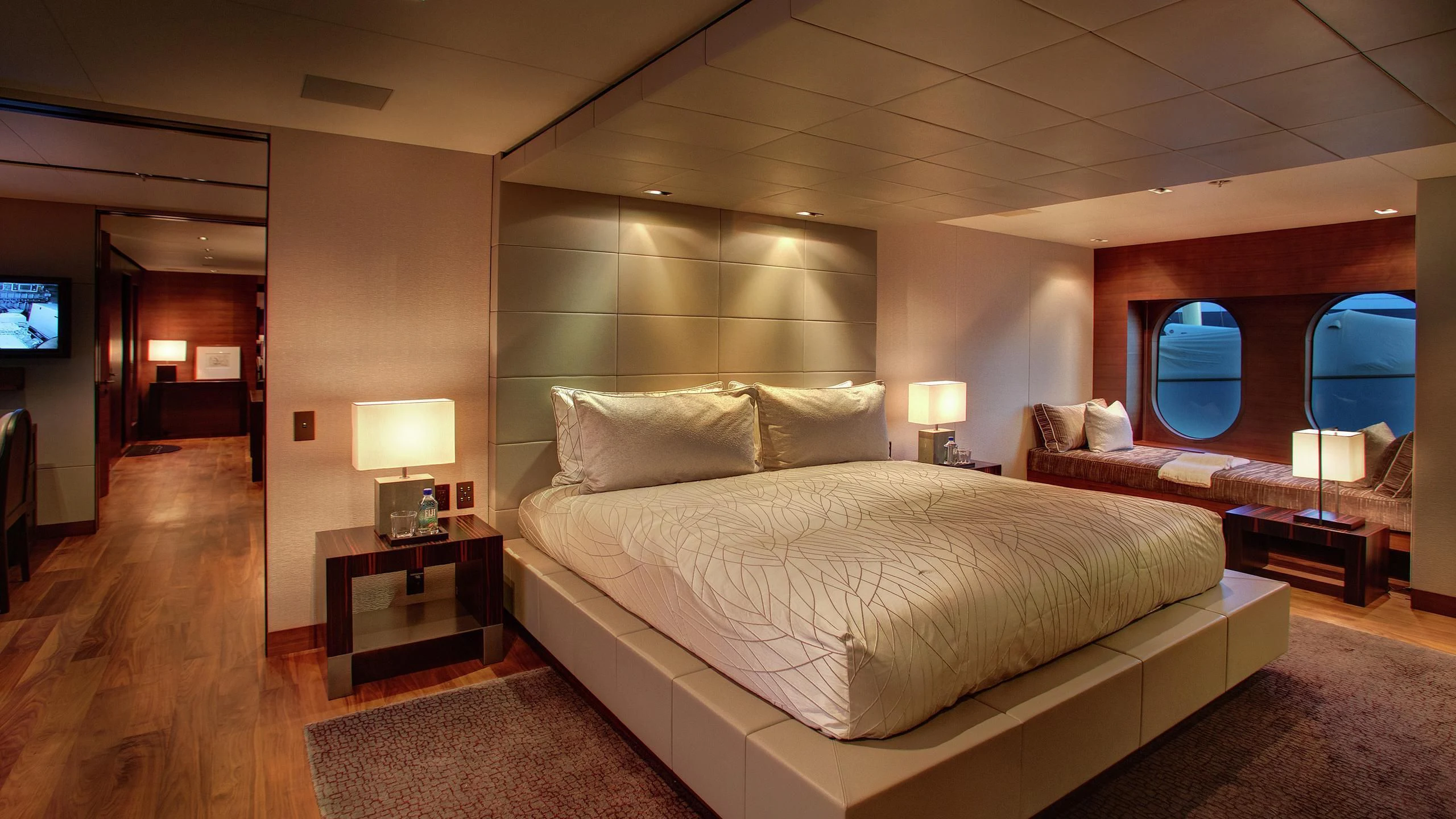 a hotel room with a large bed aboard ODESSA Yacht for Sale