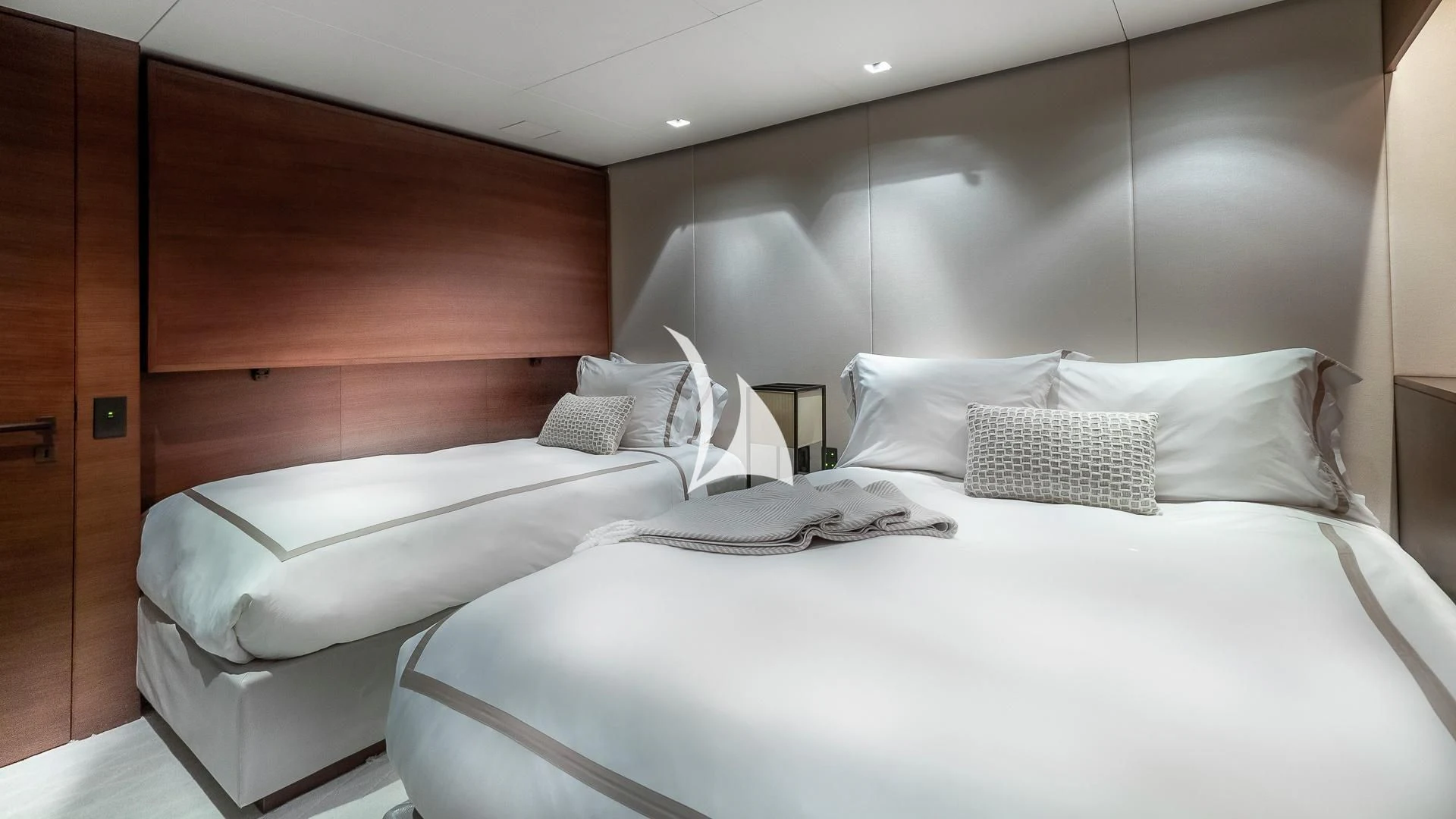 a couple of beds in a room aboard ODESSA Yacht for Sale