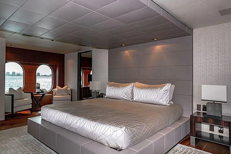 a large bed in a room aboard ODESSA Yacht for Sale
