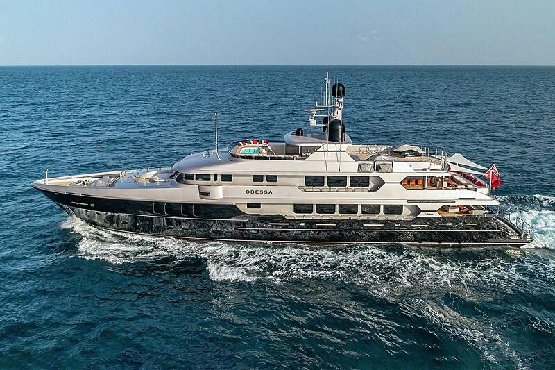 a large ship in the water aboard ODESSA Yacht for Sale