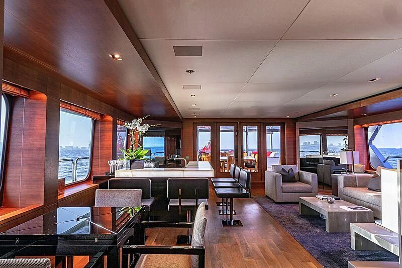 a living room with a wood floor aboard ODESSA Yacht for Sale