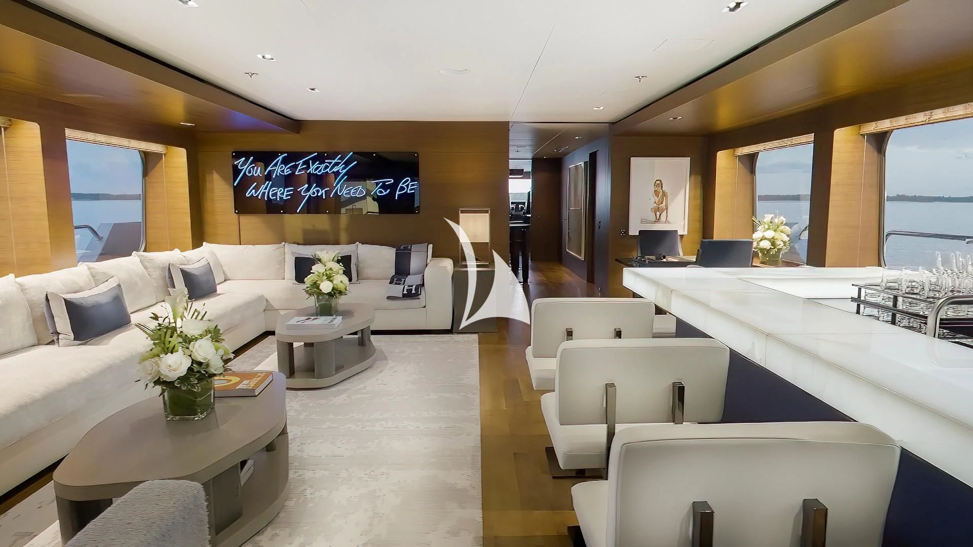 a room with white couches and tables aboard ODESSA Yacht for Sale