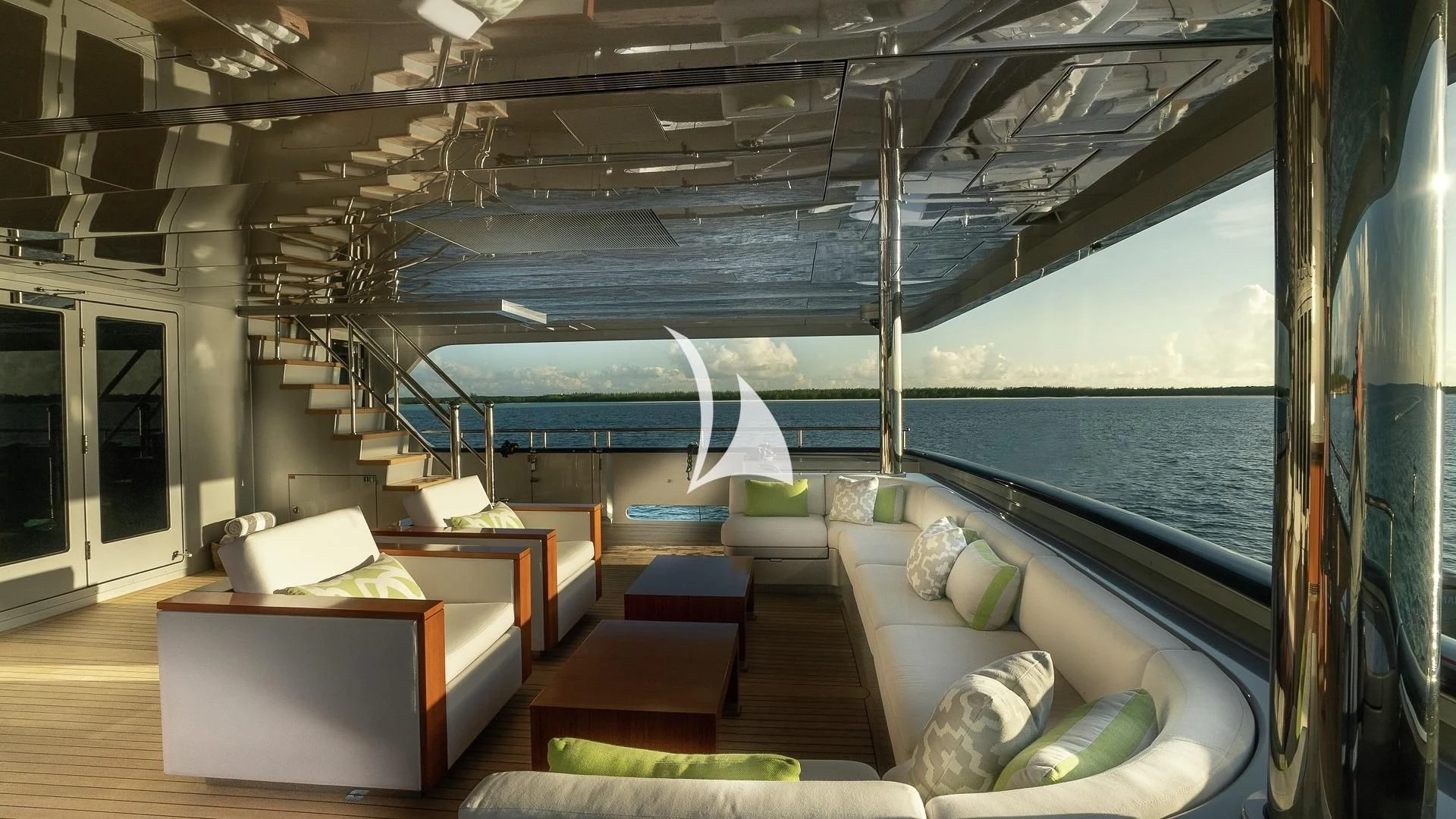 a room with a couch and a bed aboard ODESSA Yacht for Sale