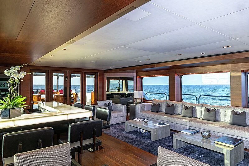 a living room with a large window aboard ODESSA Yacht for Sale