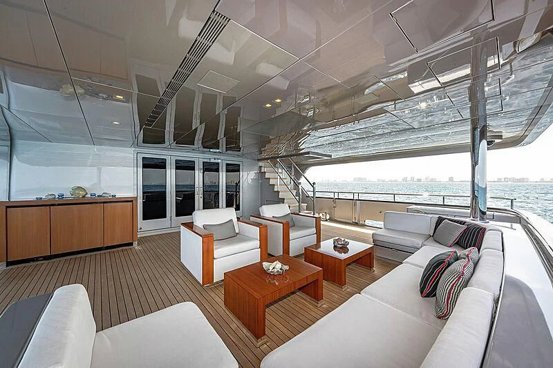 a room with a large window and a view of the ocean aboard ODESSA Yacht for Sale