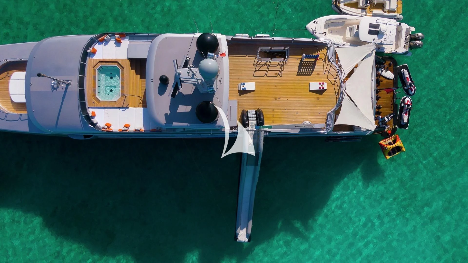 a helicopter on a field aboard ODESSA Yacht for Sale