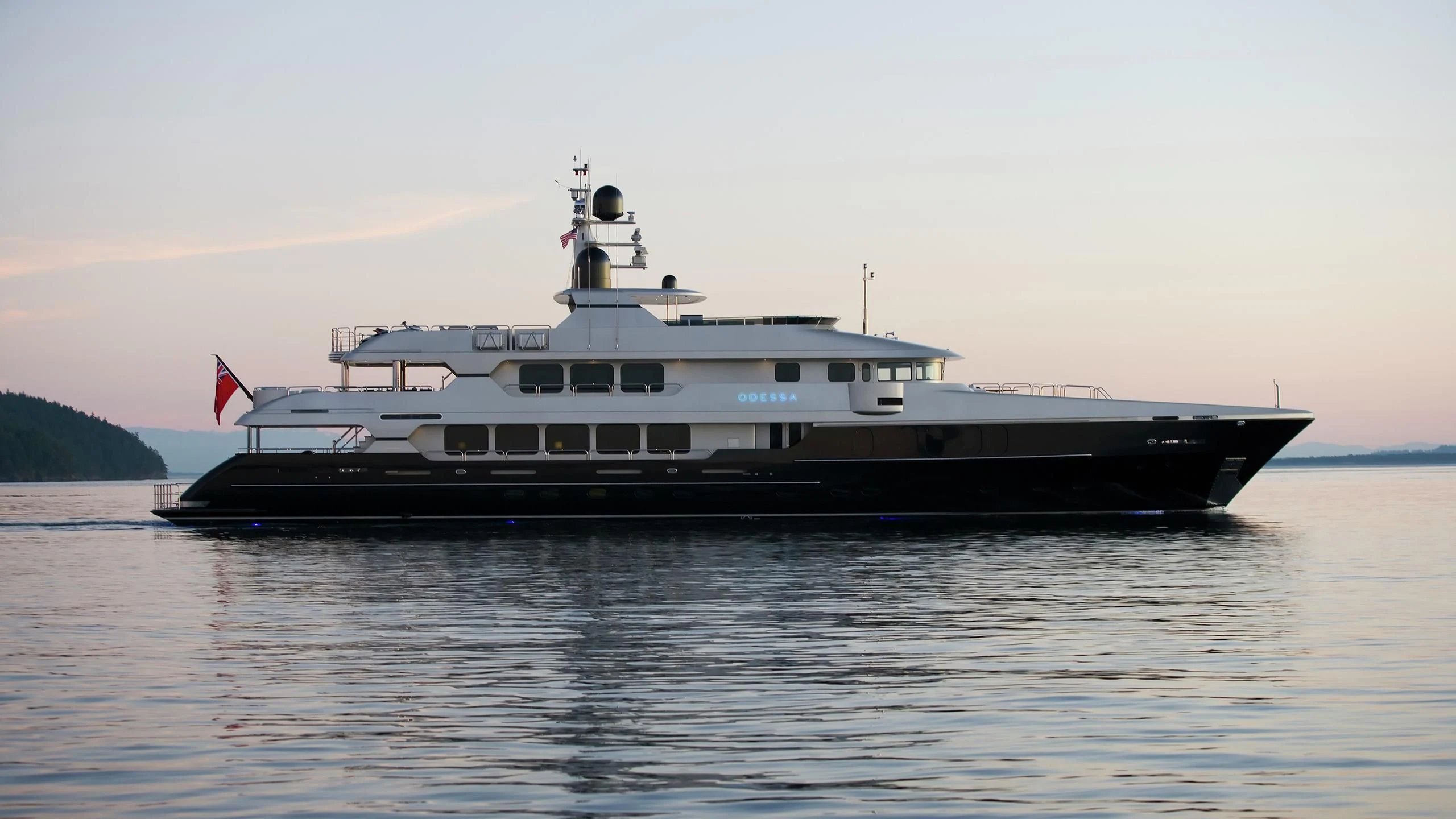 a large boat on the water aboard ODESSA Yacht for Sale