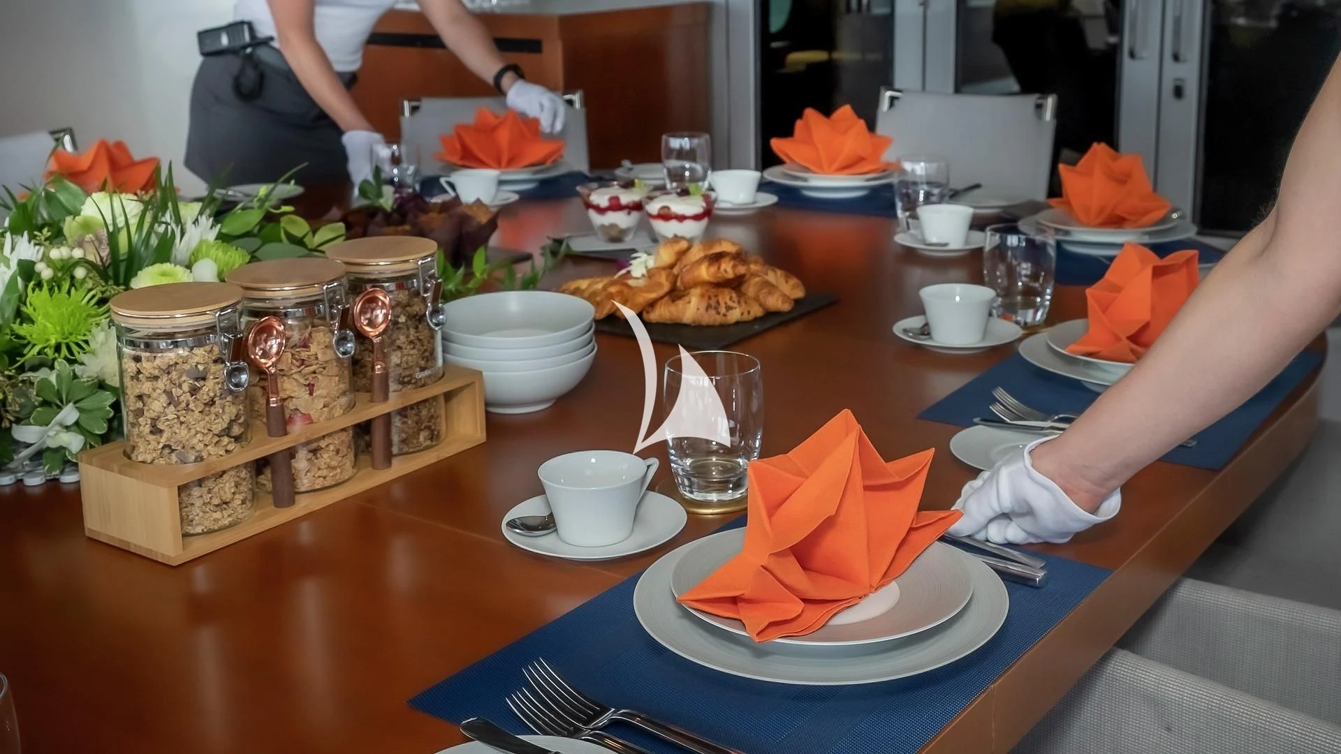 a table with food and drinks aboard ODESSA Yacht for Sale