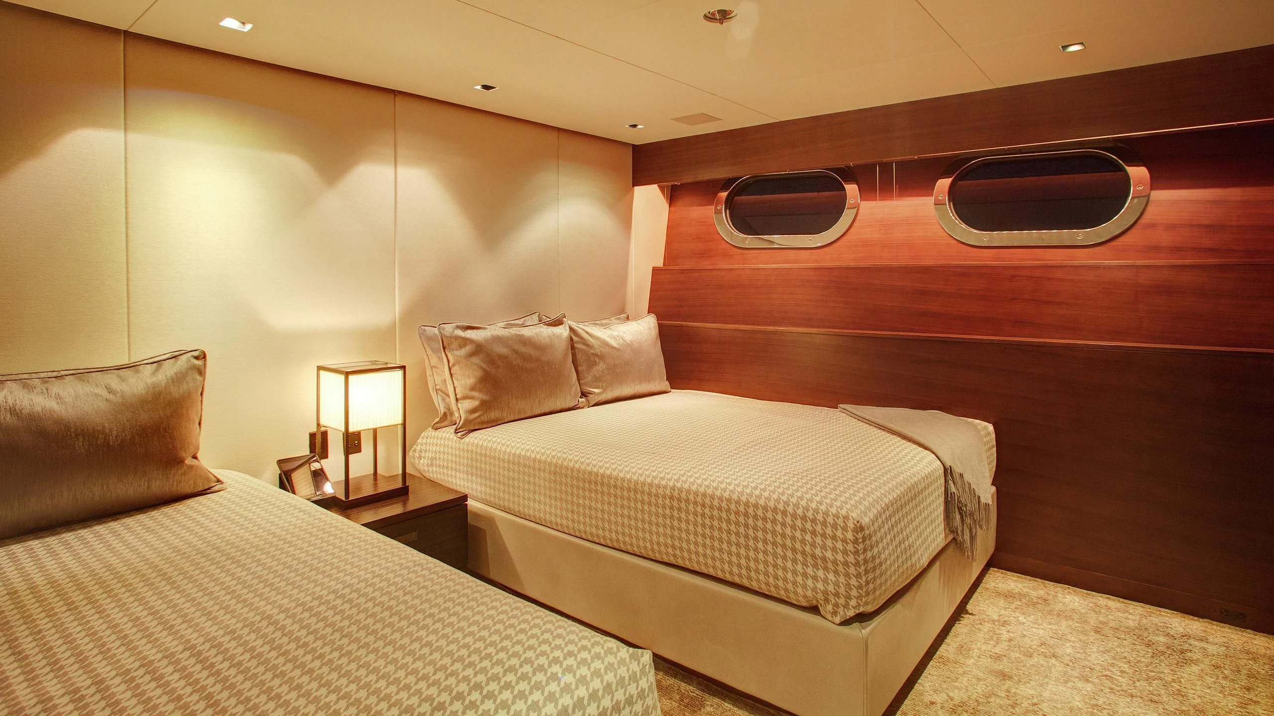 a couple of beds in a room aboard ODESSA Yacht for Sale
