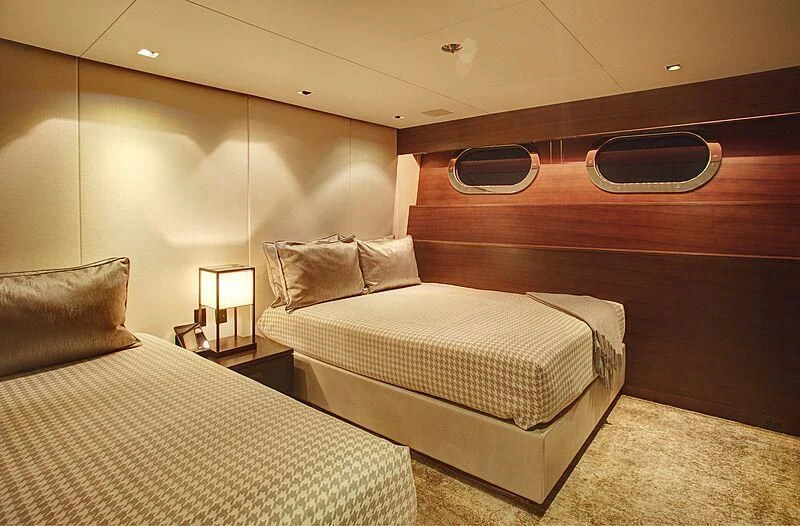 a room with two beds aboard ODESSA Yacht for Sale