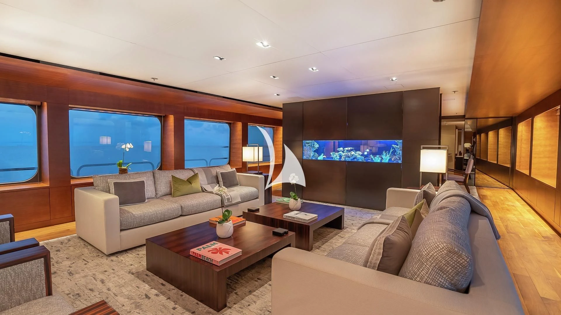 a living room with a couch and a coffee table aboard ODESSA Yacht for Sale