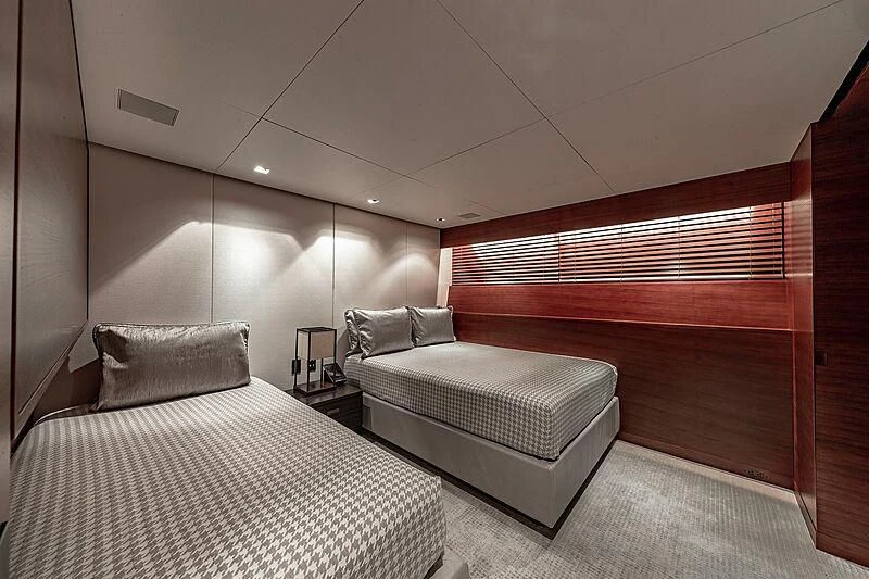 a room with two beds aboard ODESSA Yacht for Sale