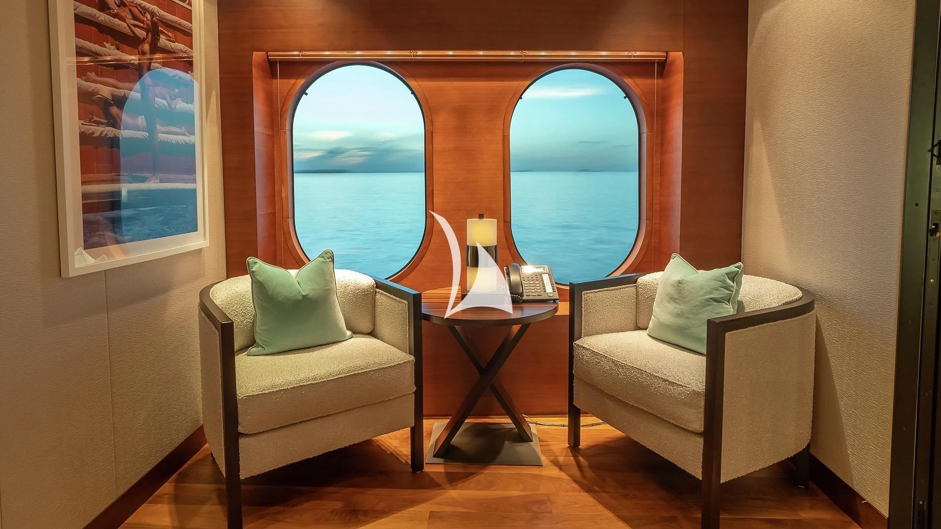 a room with a couple of couches and a table aboard ODESSA Yacht for Sale