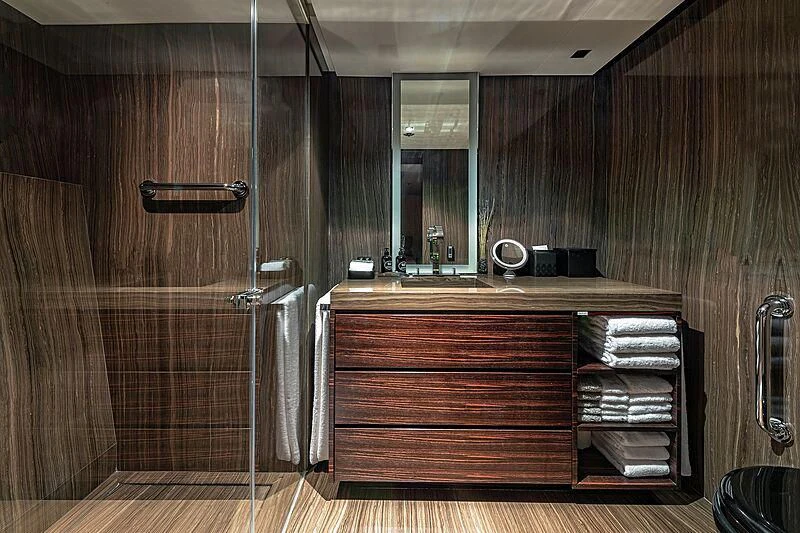 a bathroom with a wood cabinet aboard ODESSA Yacht for Sale