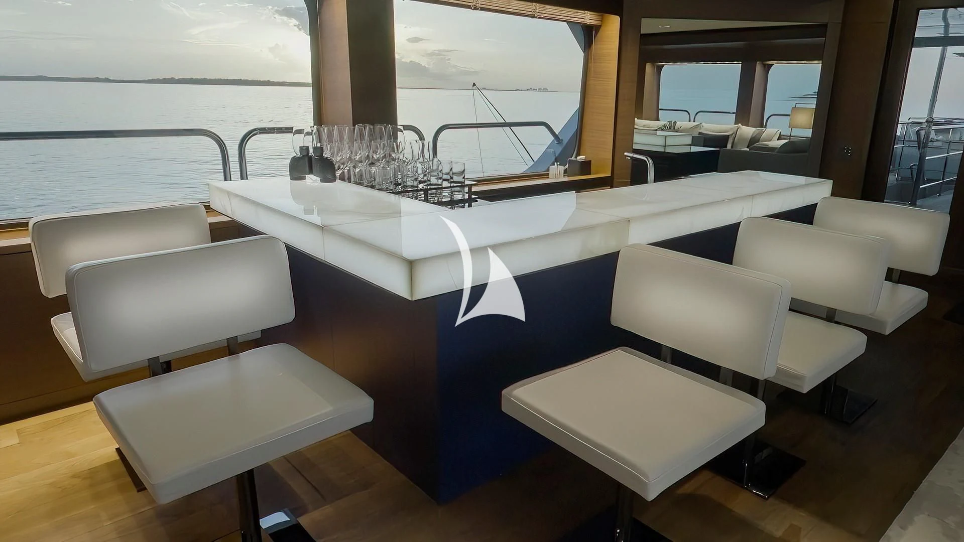 a room with a table and chairs aboard ODESSA Yacht for Sale