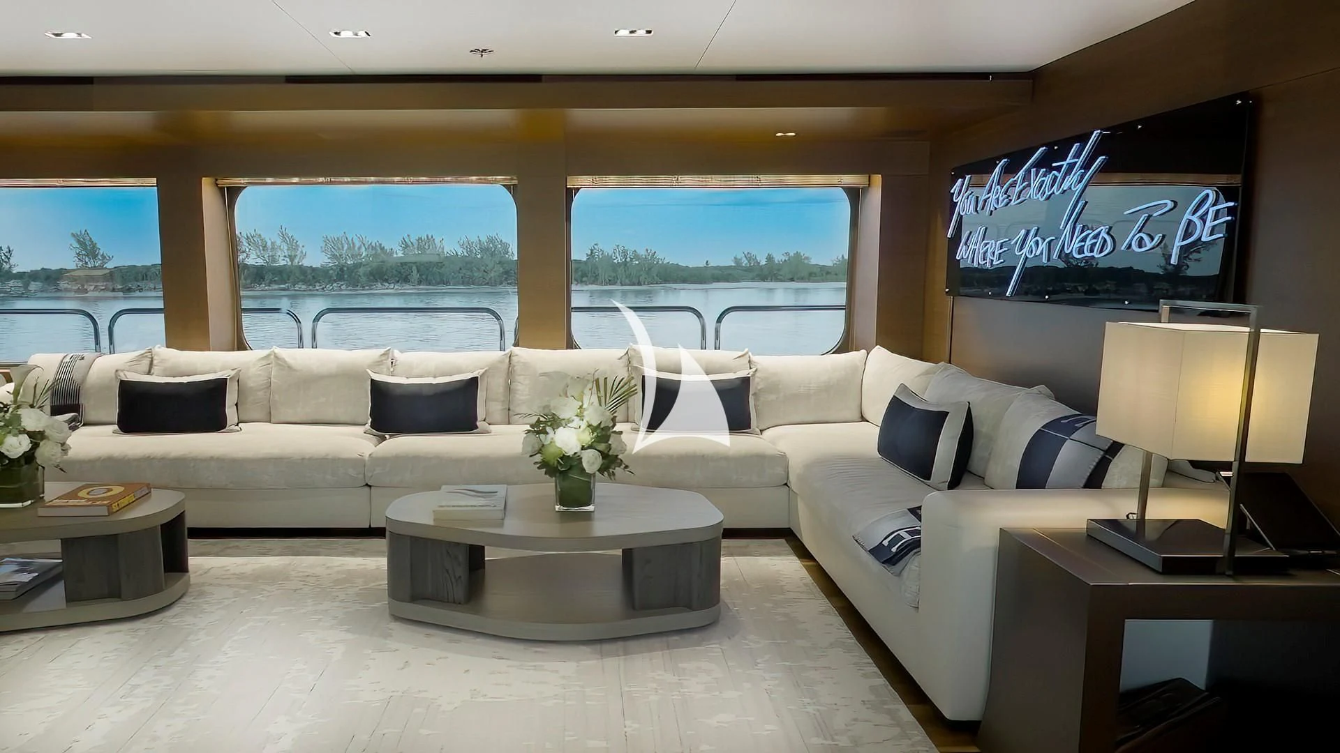 a living room with a large window aboard ODESSA Yacht for Sale