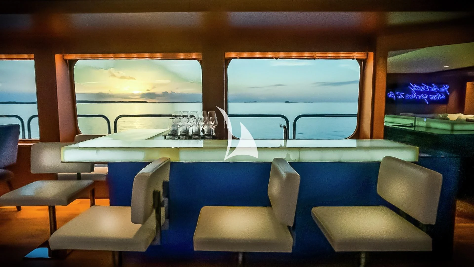 a train with a table and chairs aboard ODESSA Yacht for Sale