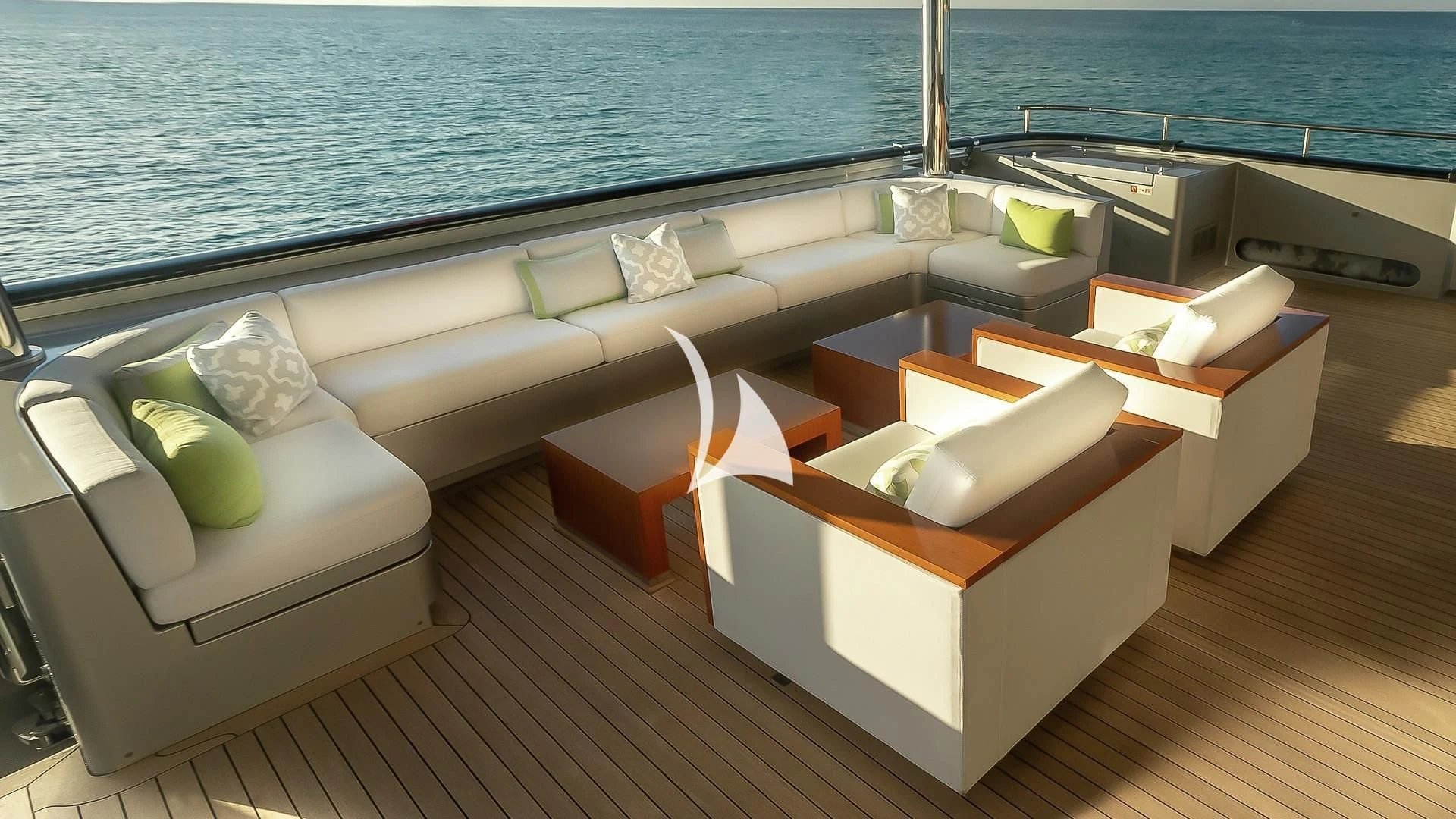 a couch with a table on it aboard ODESSA Yacht for Sale