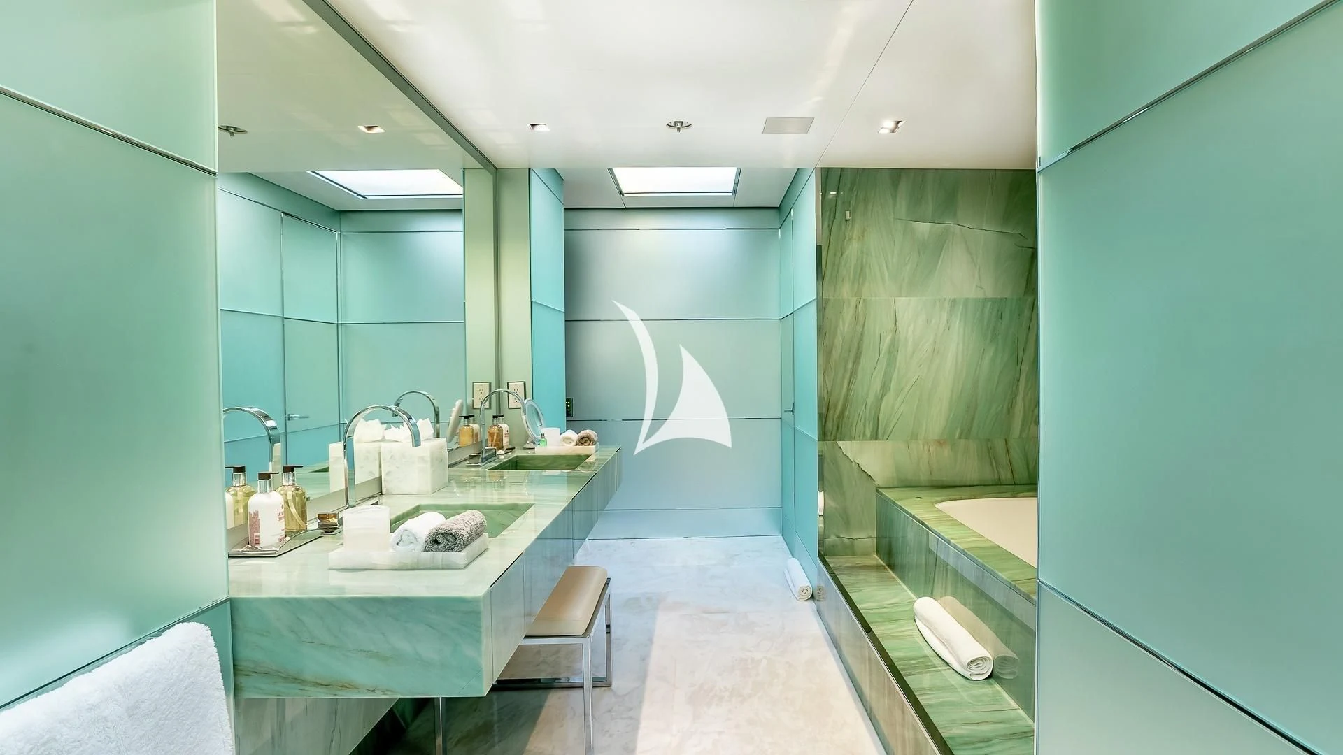 a bathroom with a sink and a bathtub aboard ODESSA Yacht for Sale