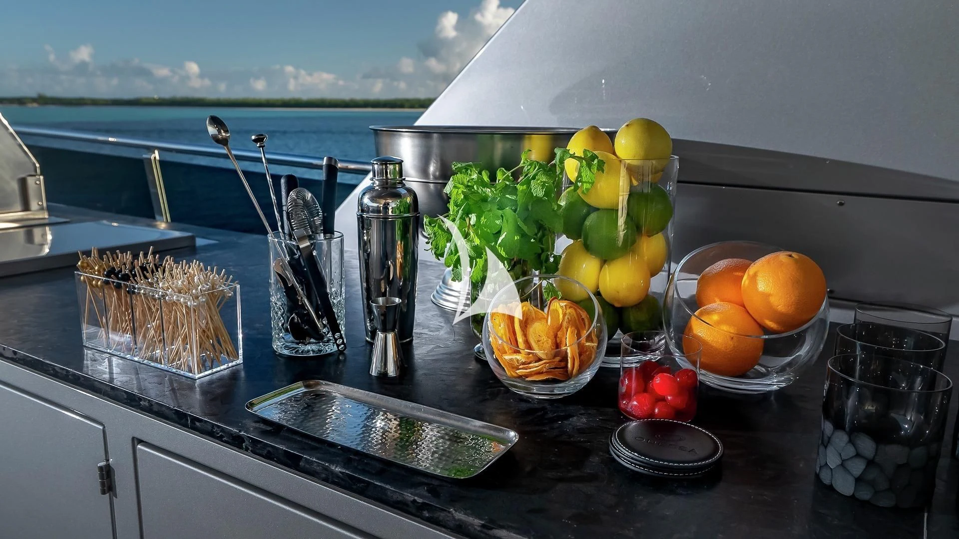 a kitchen counter with fruits and vegetables aboard ODESSA Yacht for Sale