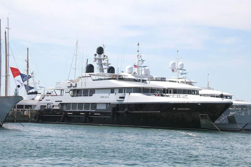 a large white boat in the water aboard ODESSA Yacht for Sale