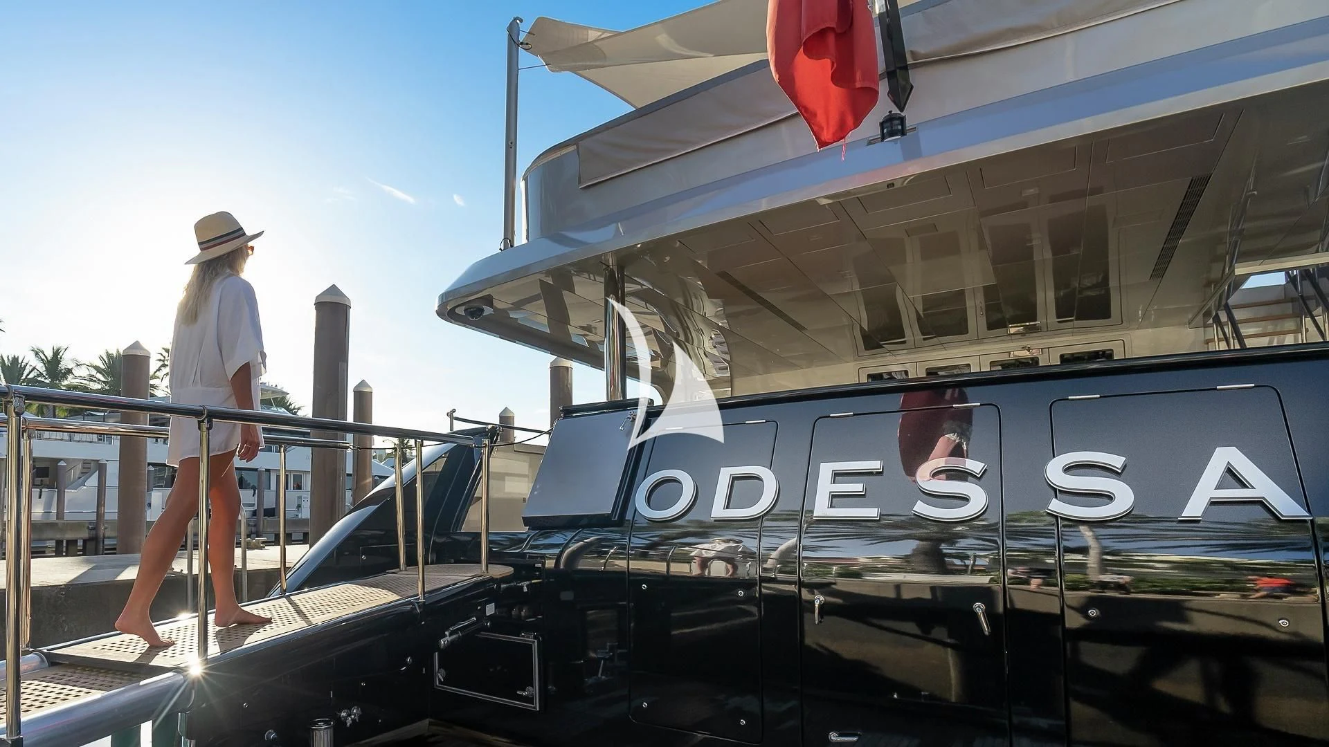 a person standing on a boat aboard ODESSA Yacht for Sale