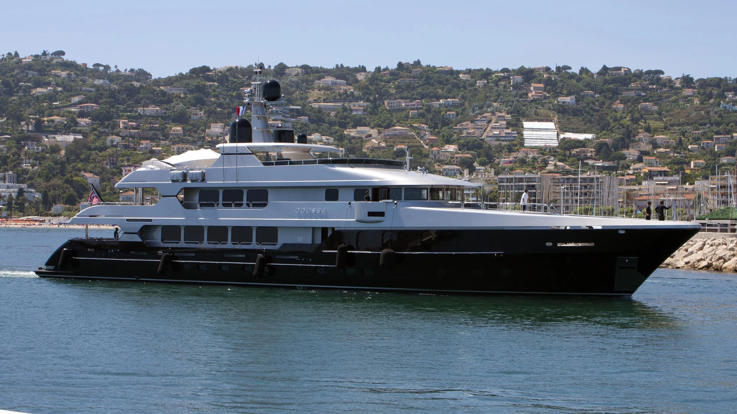 a large boat on the water aboard ODESSA Yacht for Sale