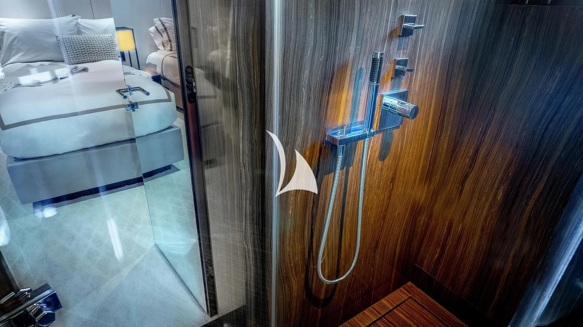 a room with a bed and a desk aboard ODESSA Yacht for Sale