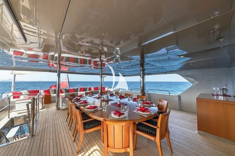a room with a table and chairs aboard ODESSA Yacht for Sale