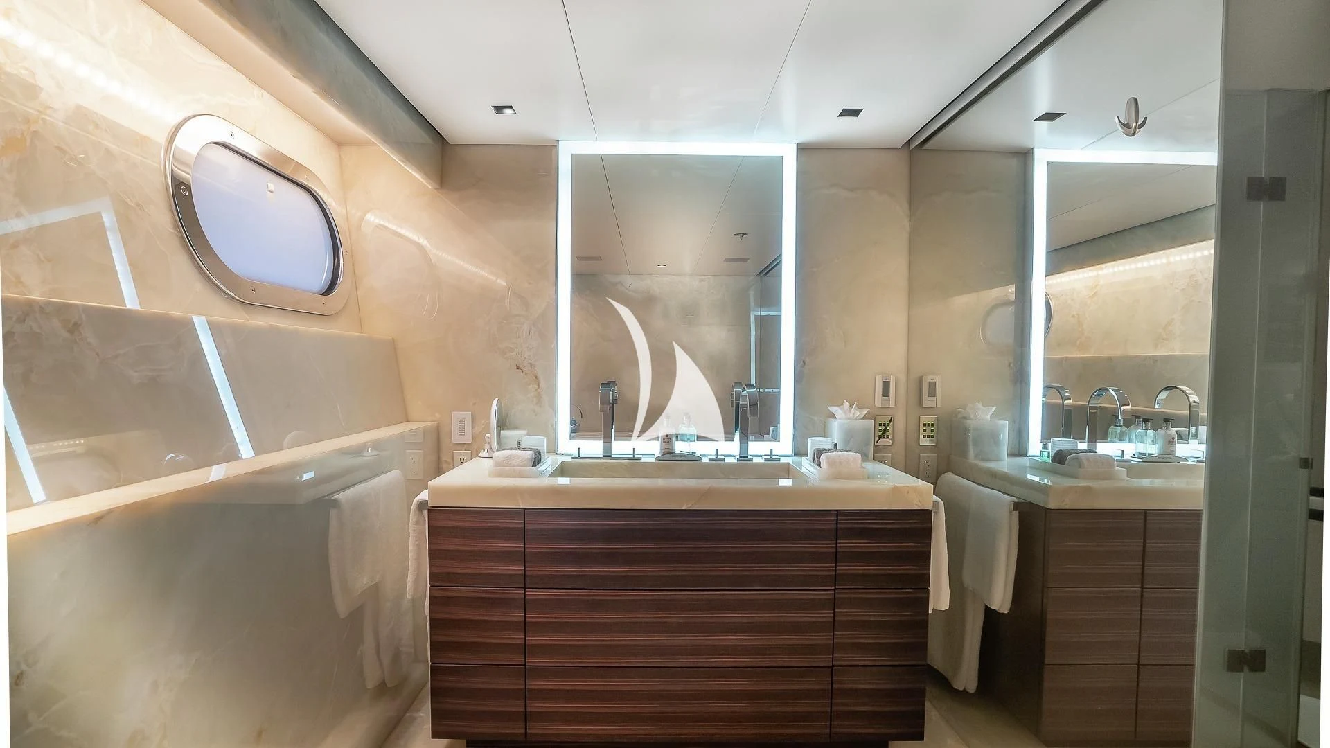 a bathroom with a sink and a mirror aboard ODESSA Yacht for Sale