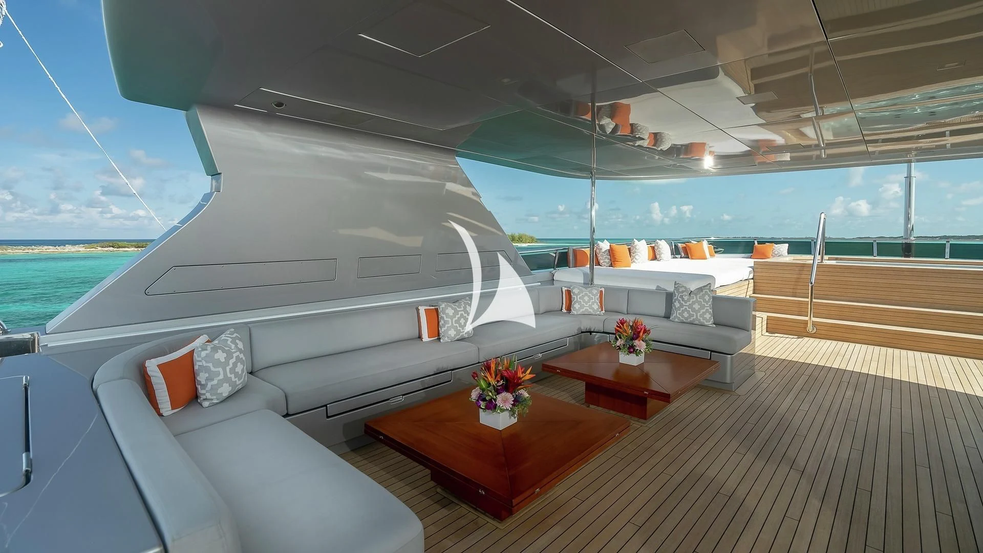 a large white boat on a deck aboard ODESSA Yacht for Sale