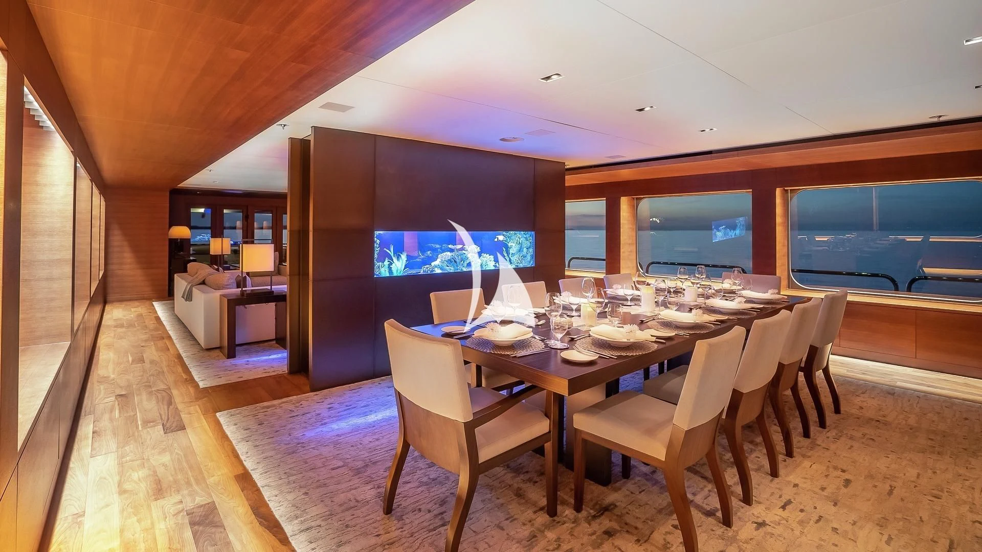 a dining room with a table and chairs aboard ODESSA Yacht for Sale