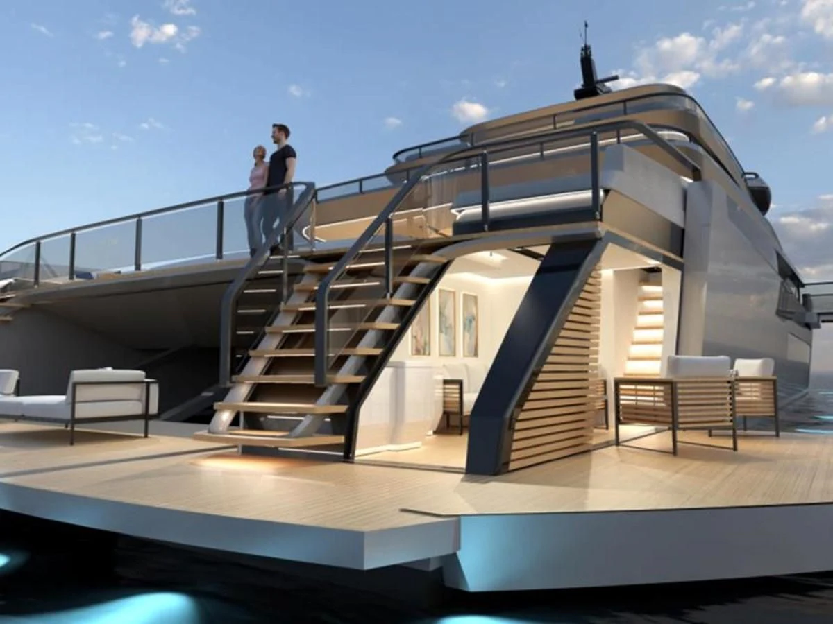 a person standing on a staircase aboard ZEFFIRO 150' Yacht for Sale