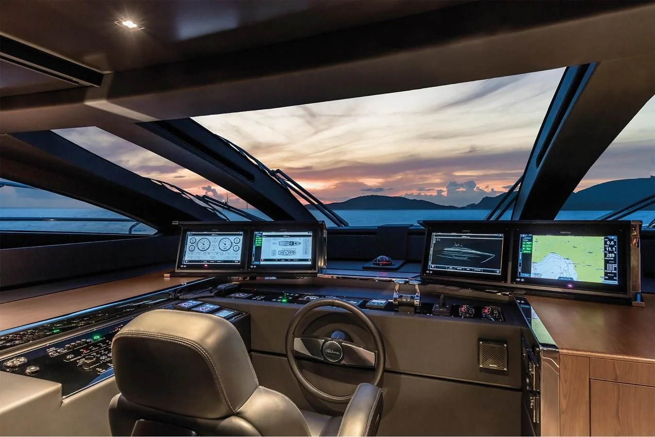 inside of a car with screens aboard RIVA 90' ARGO Yacht for Sale