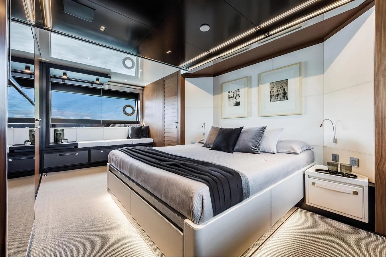 a bed in a room aboard RIVA 90' ARGO Yacht for Sale