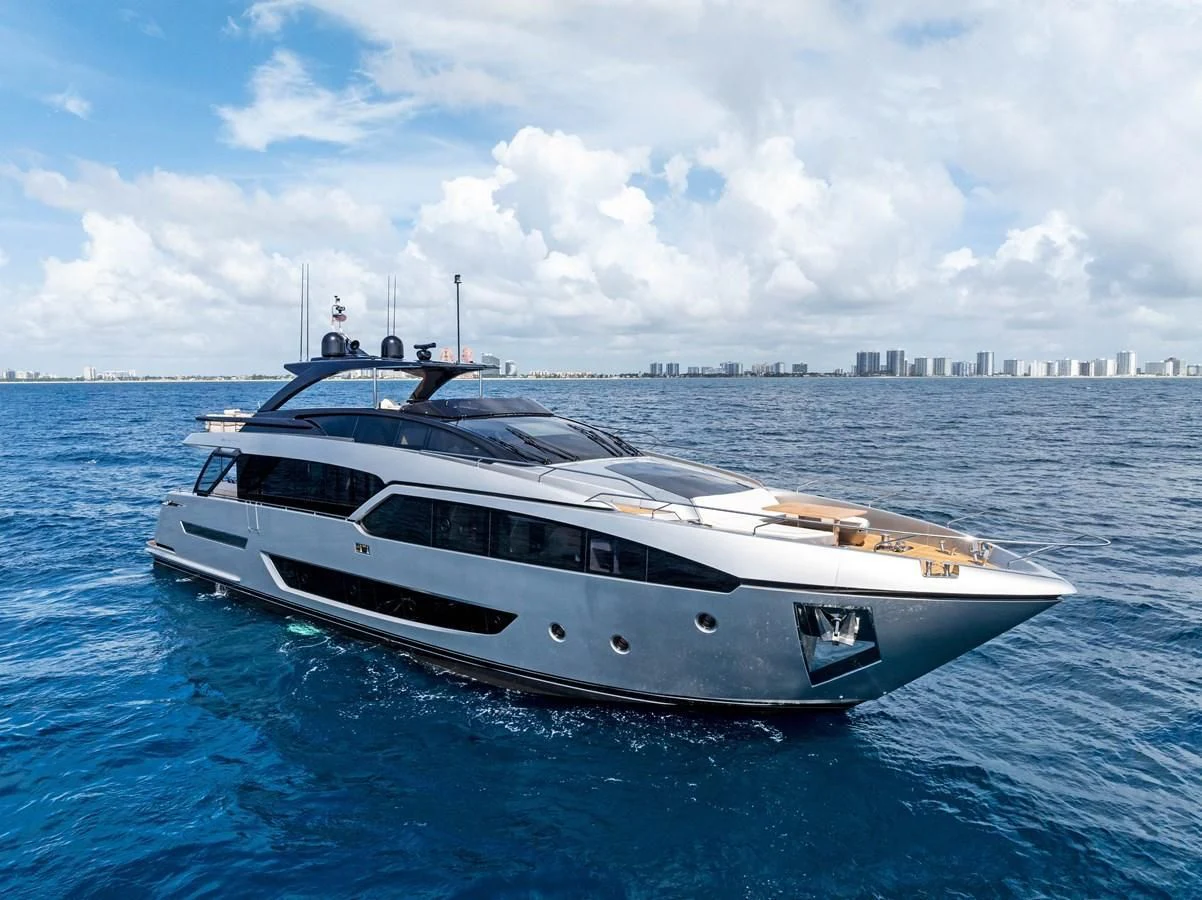 a white yacht in the water aboard RIVA 90' ARGO Yacht for Sale