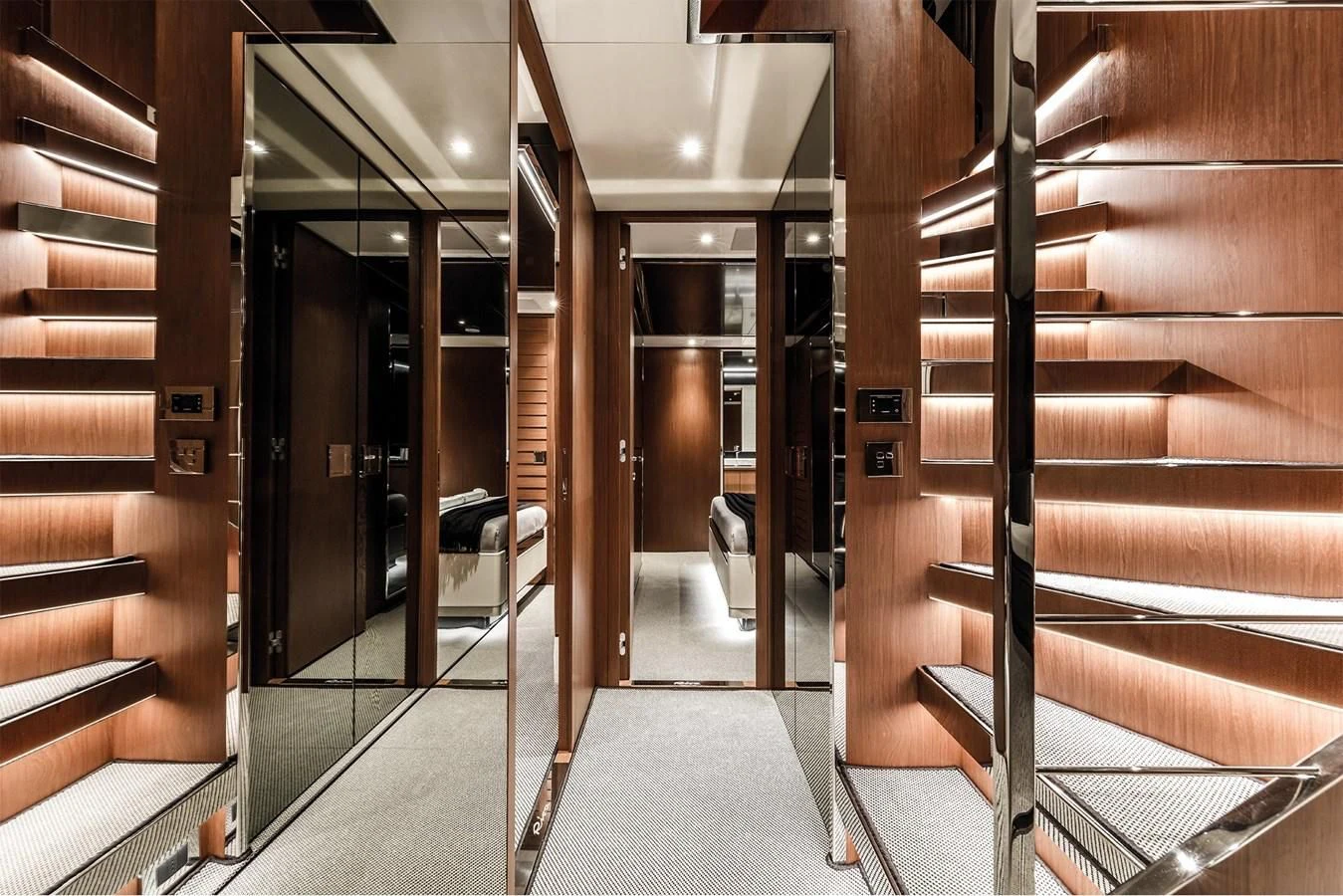a room with wooden walls and wood stairs aboard RIVA 90' ARGO Yacht for Sale