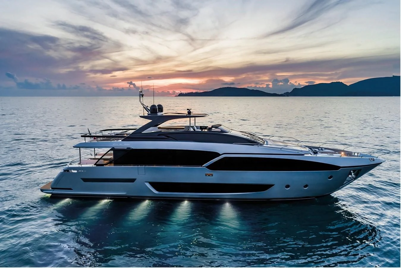 a white boat in the water aboard RIVA 90' ARGO Yacht for Sale