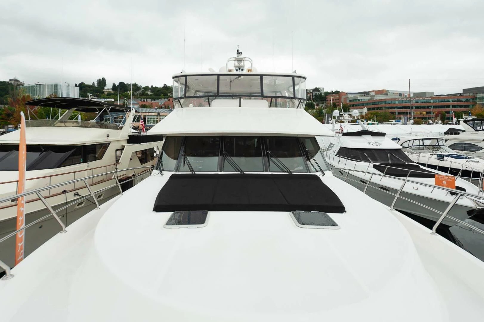 a group of boats are parked in a harbor aboard COCONUT Yacht for Sale