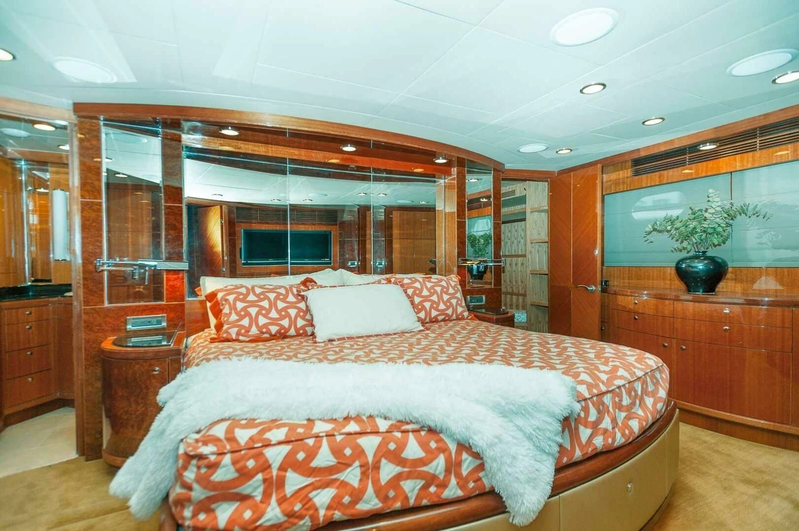 a large bed in a room aboard COCONUT Yacht for Sale
