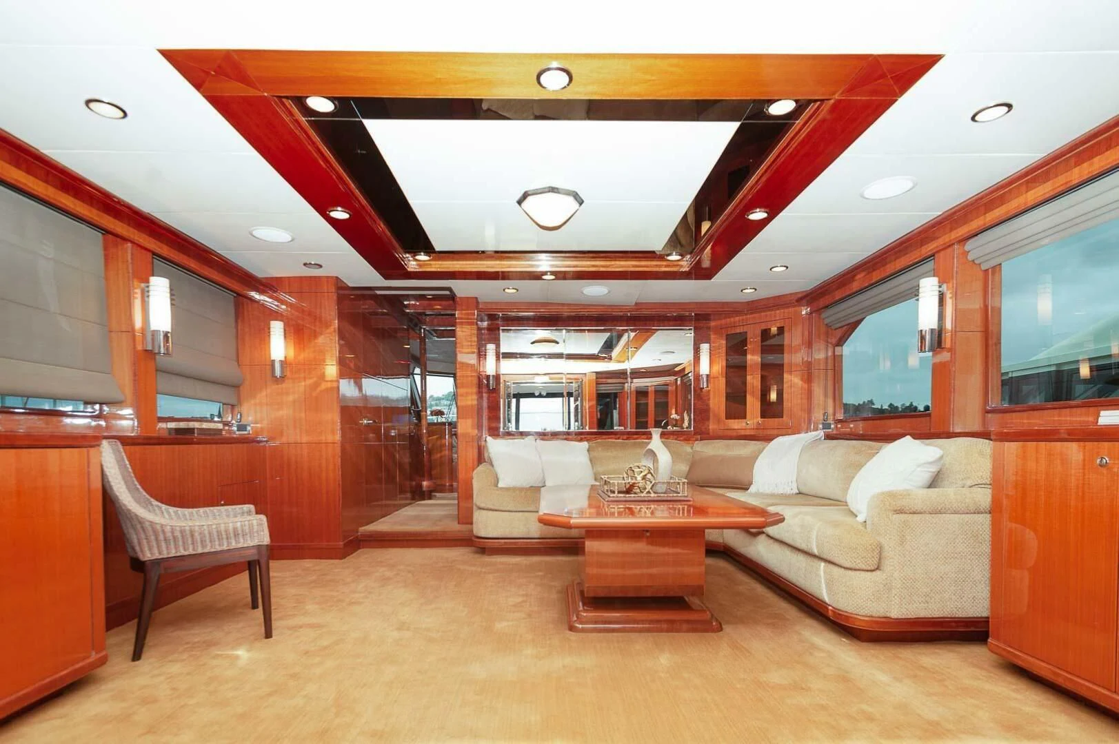 a living room with a couch and a table aboard COCONUT Yacht for Sale