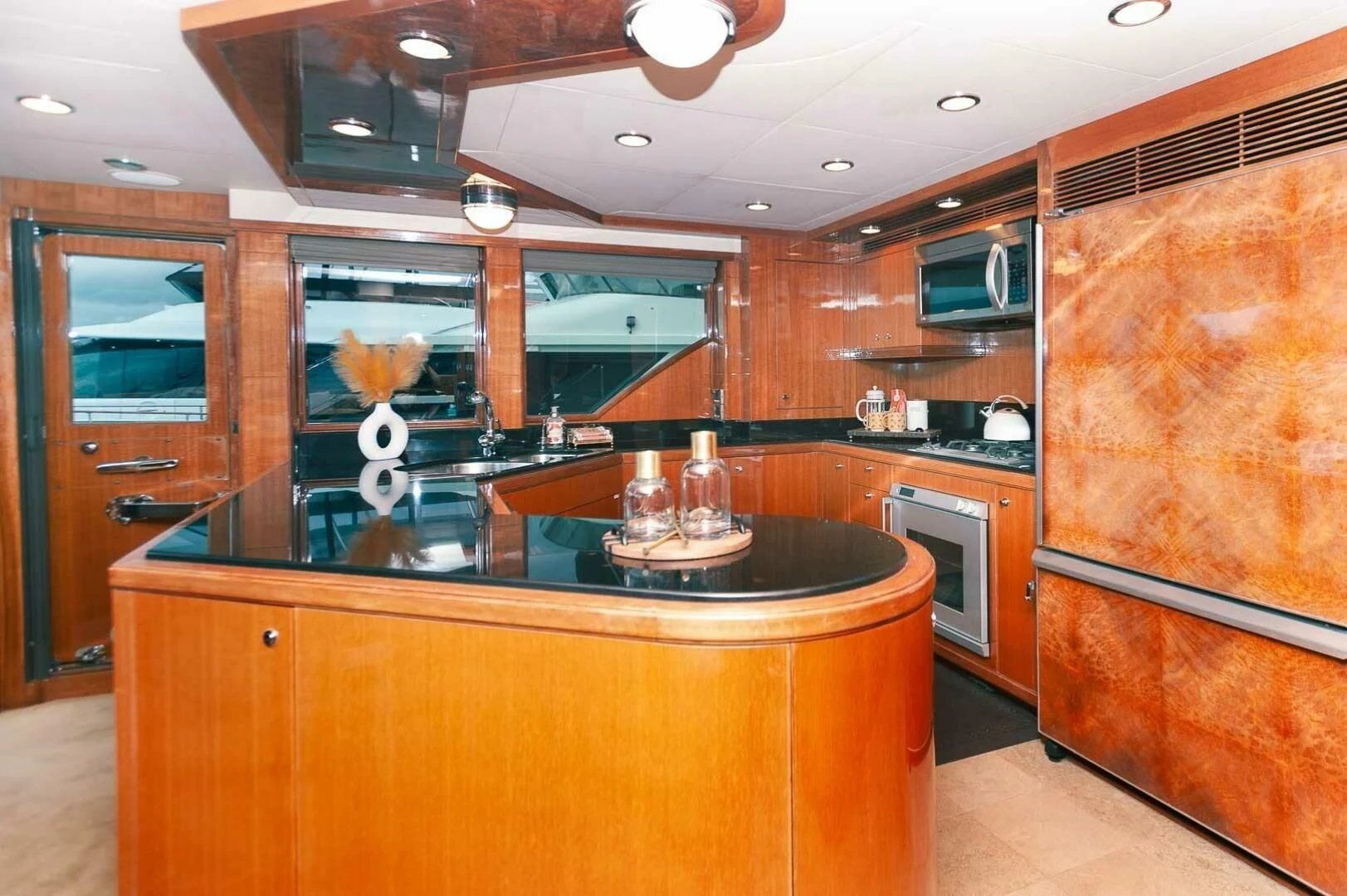 a kitchen with a large island aboard COCONUT Yacht for Sale