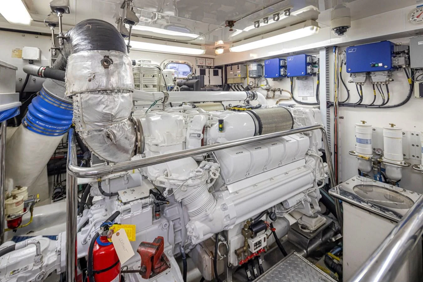 a couple of people in a room aboard COCONUT Yacht for Sale